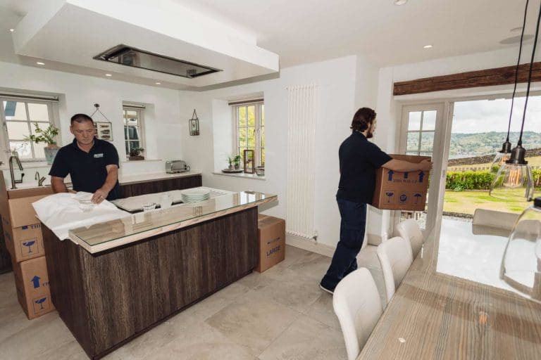 Roy Trevor team packing kitchen